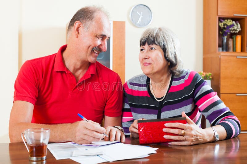 Happy Mature Couple With Financial Documents Stock Image Image Of Questionnaire Invoice 35422169