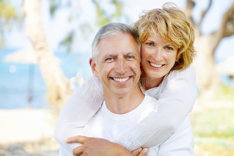 Happy mature couple outdoors stock photography