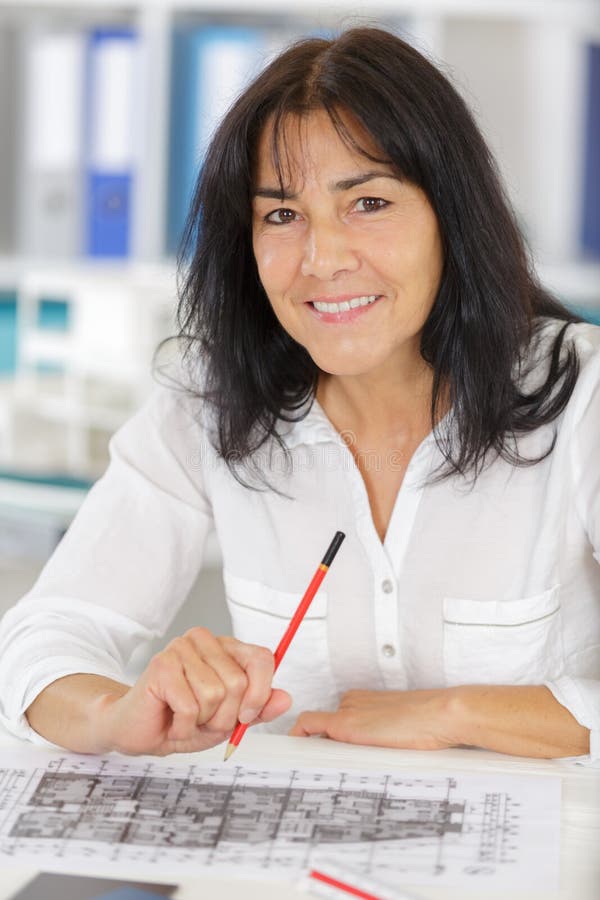 Happy mature female engineer royalty free stock images