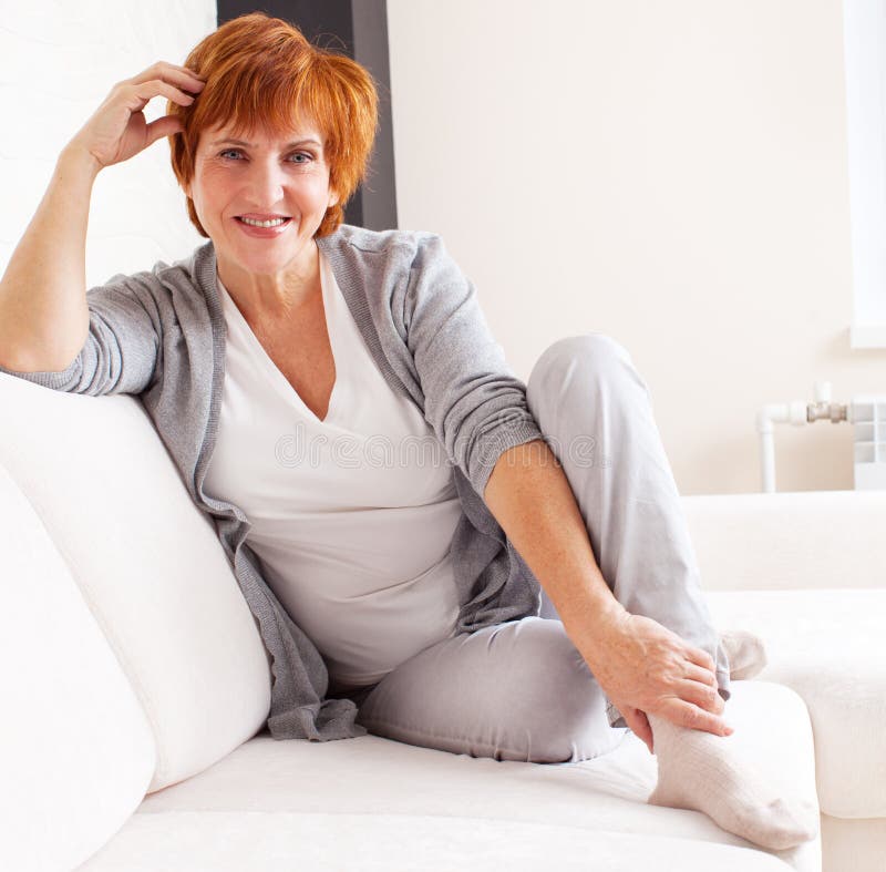 Happy Mature Female On Sofa Stock Image Image Of Looking Happy 44531723