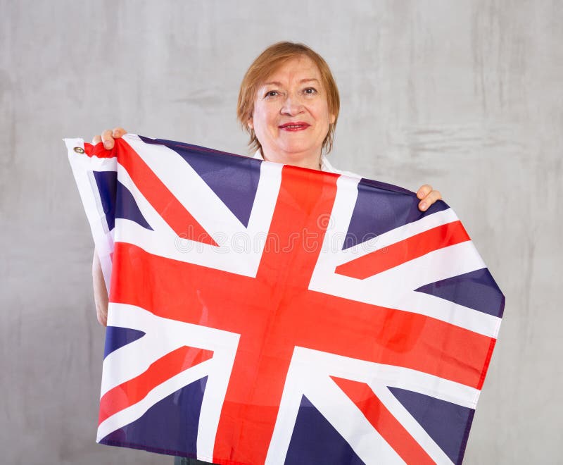117 Woman Standing Uk Flag Background Stock Photos - Free