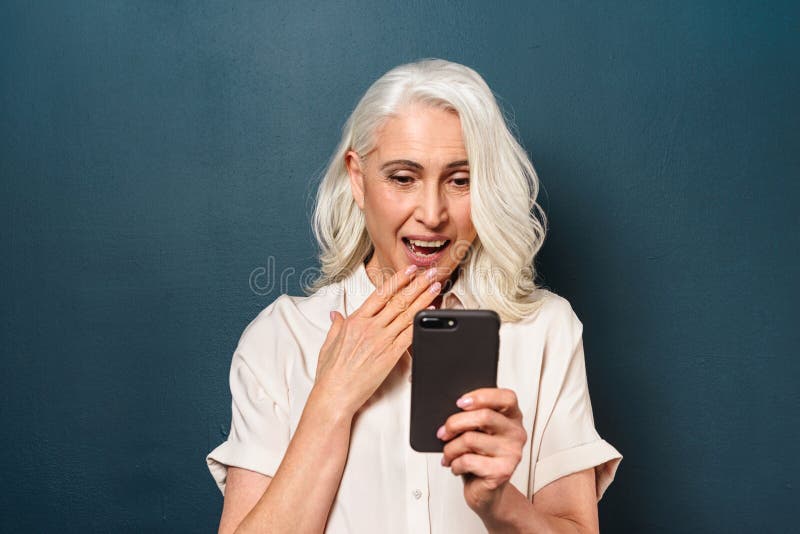 Happy Mature Old Woman Using Mobile Phone Stock Image - Image of happy