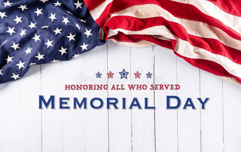 Happy memorial day concept made from american flag with text over white wooden background
