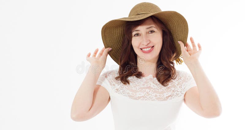 Happy middle age woman in summer hat isolated on white background with copy space. Summertime accessory face wrinkle skin