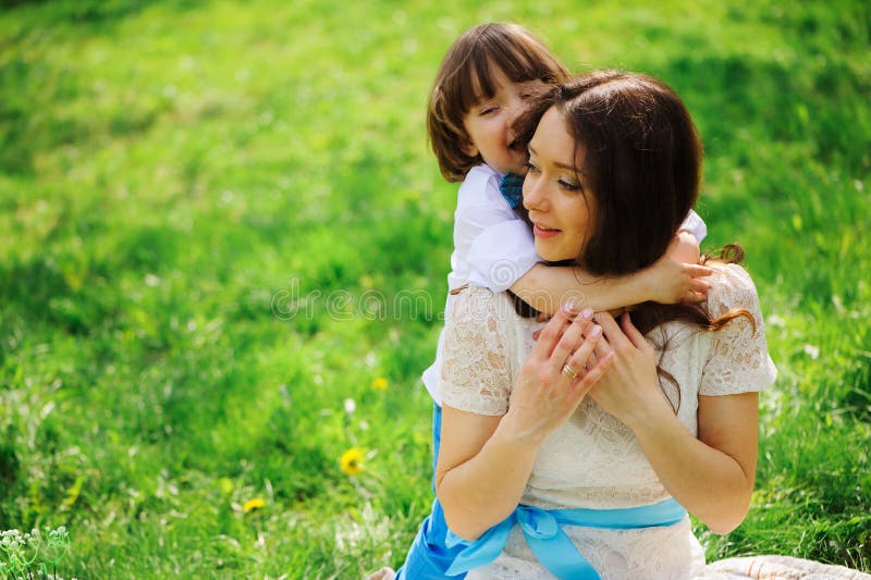 happy mom hugs and kiss toddler kid son outdoor in spring or summer royalty free stock images happy mom hugs and kiss toddler kid son outdoor in spring or summer royalty free stock images