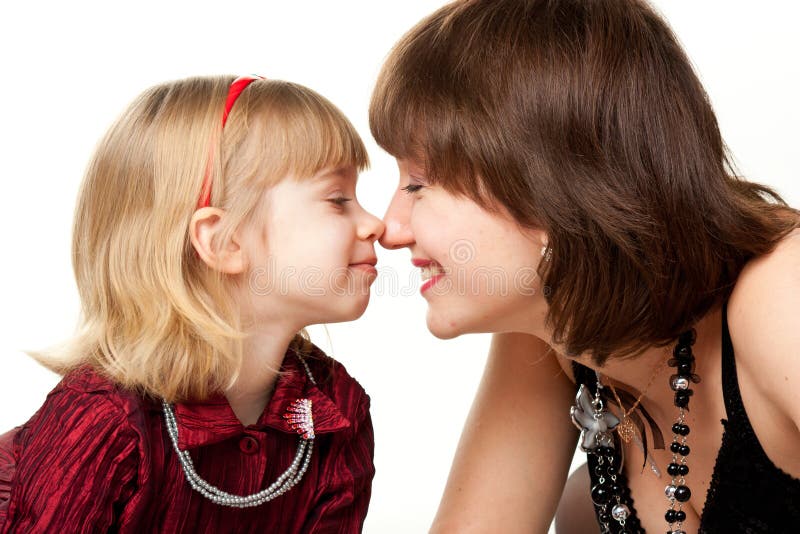 Happy mother and daughter playing