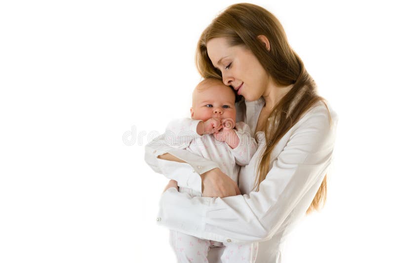 Happy mother holding a young baby girl