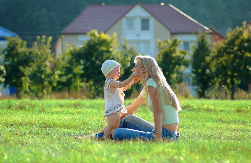 Happy mother and little child