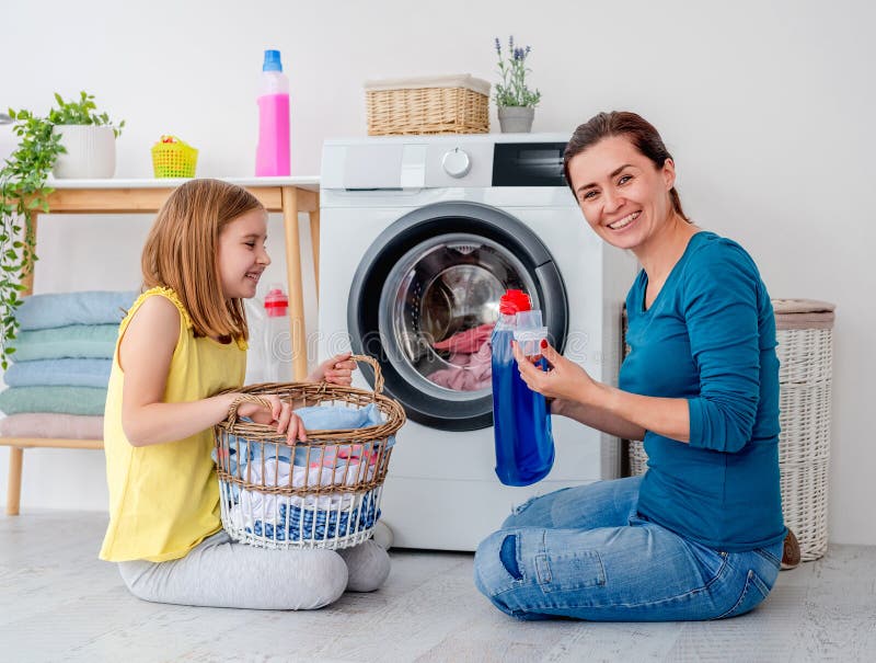 Happy Mother And Little Daughter Washing Clothes Stock Image Image Of Clean Fabric 200884543 