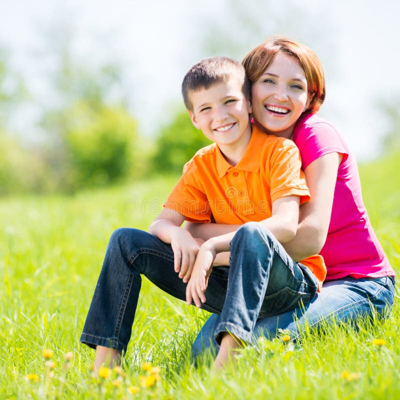 Happy mother and son outdoor portrait