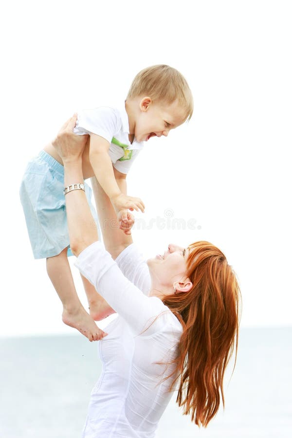 Happy mother and son playing