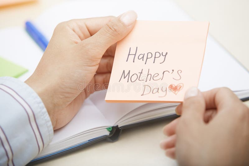 Happy mothers day text on adhevsive note stock photos