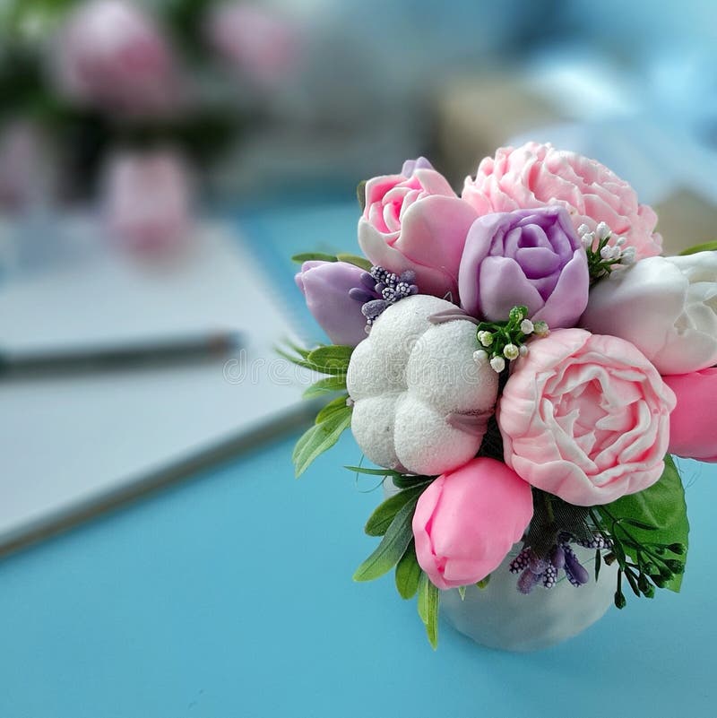 Bouquet of soap flowers on blue blurred background royalty free stock photography Bouquet of soap flowers on blue blurred background royalty free stock photography