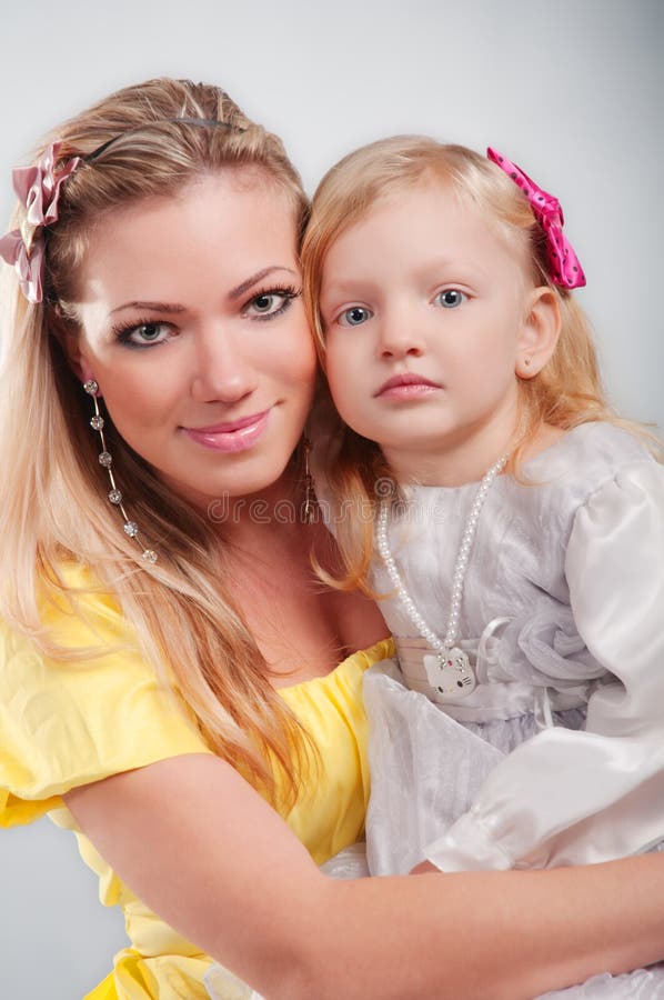 Happy mum with the daughter portrait