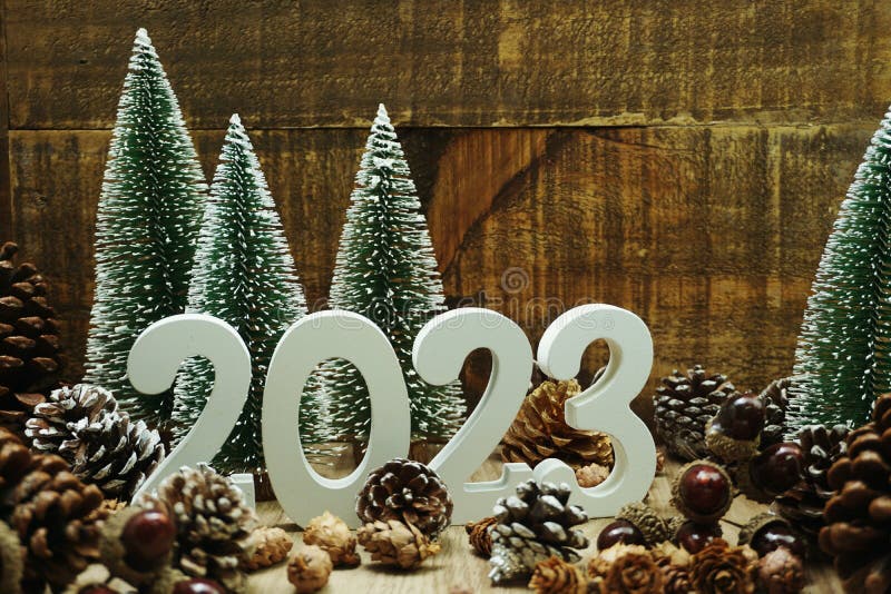 Happy New Year 2023 festive background with Christmas tree and