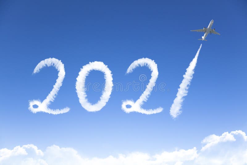 Happy New year 2021 concept. cloud drawing by airplane in sky.