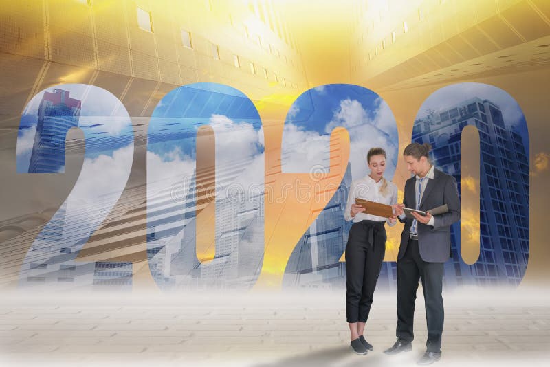 Happy New Year 2020 Digital Trend Concept, zakenman en zakenvrouw staan om bedrijfsplannen, doelstellingen en toekomstige plannin royalty-vrije stock foto's Happy New Year 2020 Digital Trend Concept, zakenman en zakenvrouw staan om bedrijfsplannen, doelstellingen en toekomstige plannin royalty-vrije stock foto's