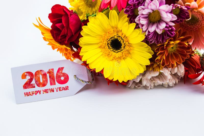 Happy new year 2016 with flower and tag isolated on a white background.  stock photography