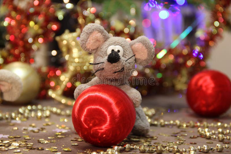 Happy New Year 2020. Grey rat and red balls, wishes for wealth and profit. Red and Golden background. Merry Christmas. stock images