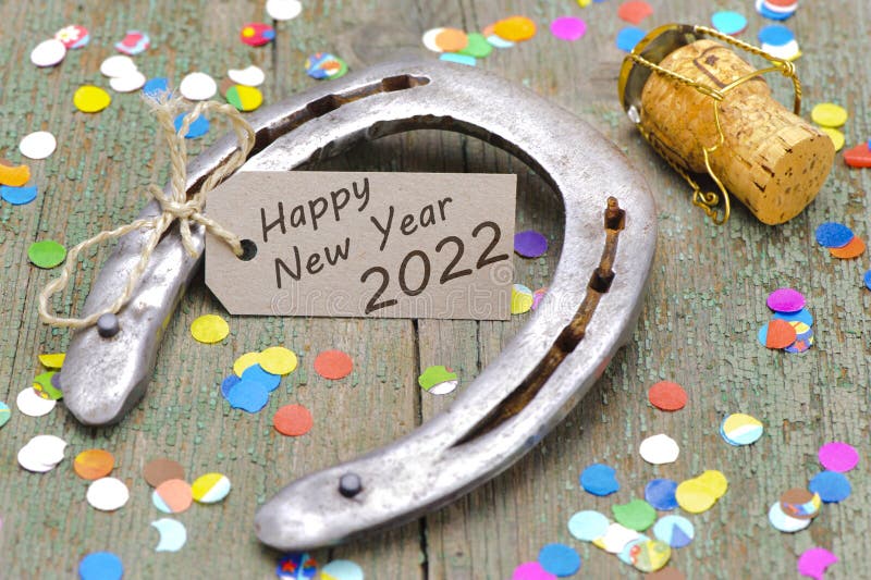 Happy new year 2022 with horseshoe stock images
