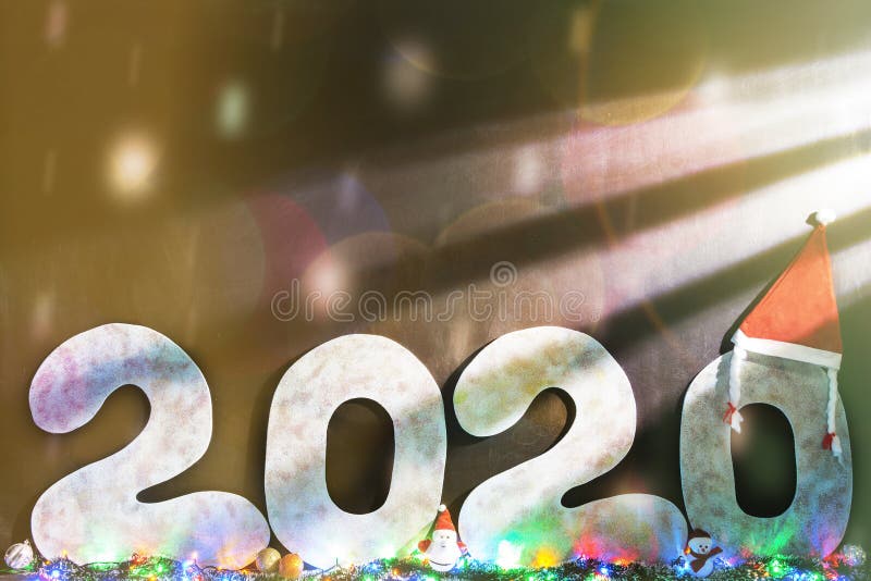 Happy new year 2020 isolated on black background with copy space for text, for holiday card. Blurred snowflakes, snow.  royalty free stock images