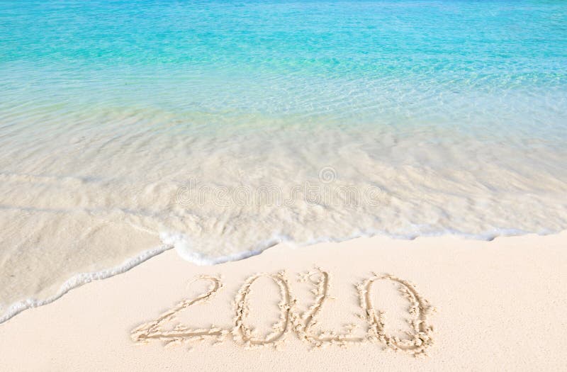 Happy New Year 2020 on the sand and beach stock photography Happy New Year 2020 on the sand and beach stock photography