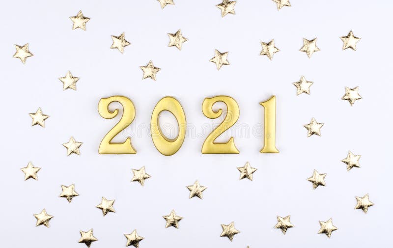 Happy New Year 2021. Sparkling gold numbers on white background with stars. object for design holiday greeting card,