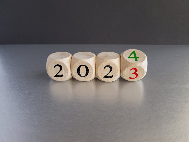 2024 Happy New Year Symbol. Wooden Cubes Symbolize the Change from 2023
