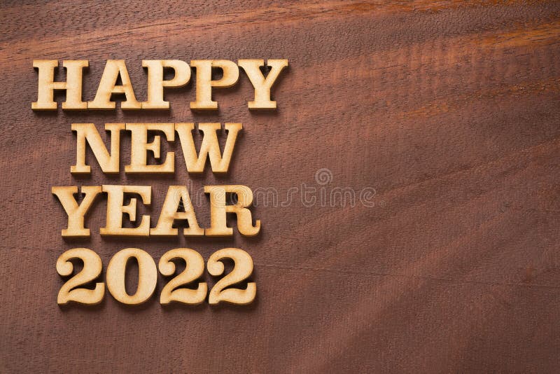 Happy new year 2022 - Text space. Happy new year 2022 in wooden letters - Text space stock photos