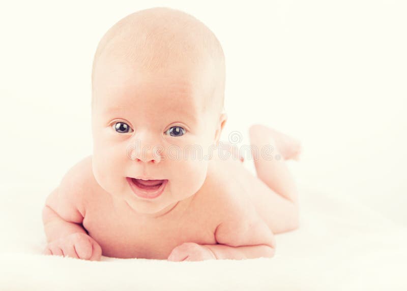 Happy newborn baby on white background