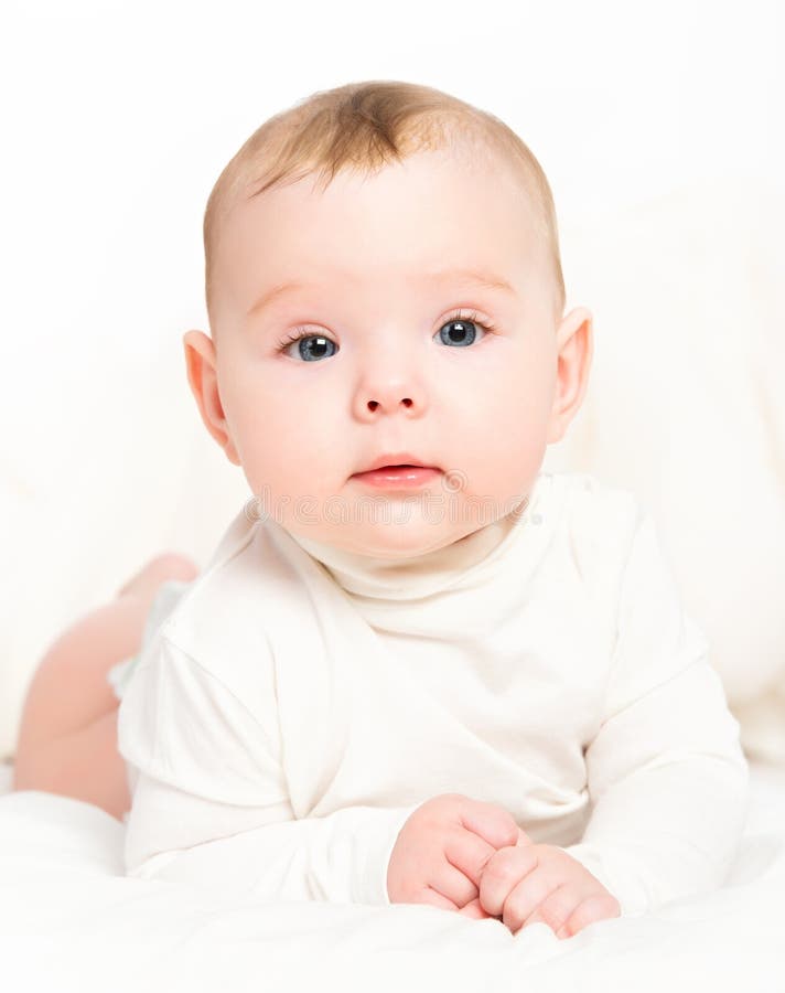 Happy newborn baby on white background