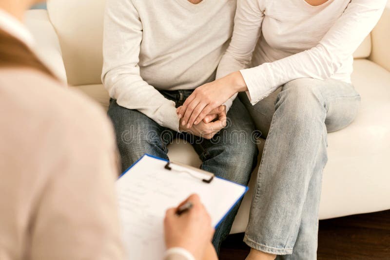 Happy nice couple holding hands together stock images Happy nice couple holding hands together stock images