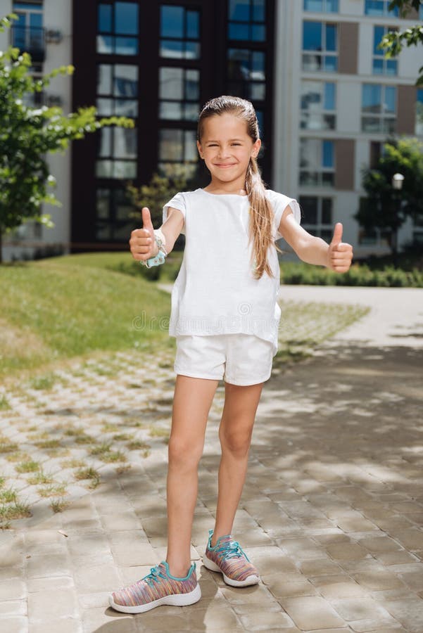 Happy nice girl showing Ok signs