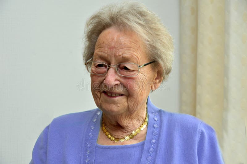 Happy ninety years old senior woman
