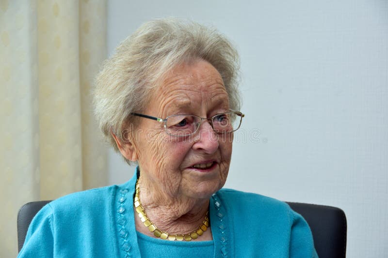 Happy ninety years old senior woman