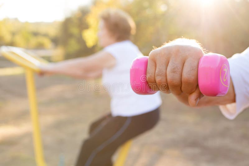 Happy older people doing outdoor sports, couples