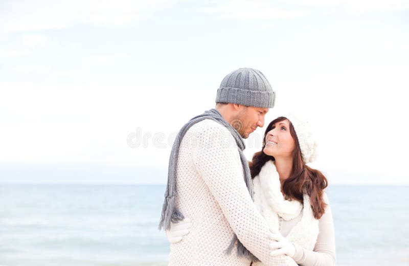 Happy outdoor autumn winter spring couple embracing. Happy outdoor autumn winter spring couple embracing