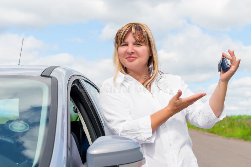 Happy owner of a new car royalty free stock photo Happy owner of a new car royalty free stock photo