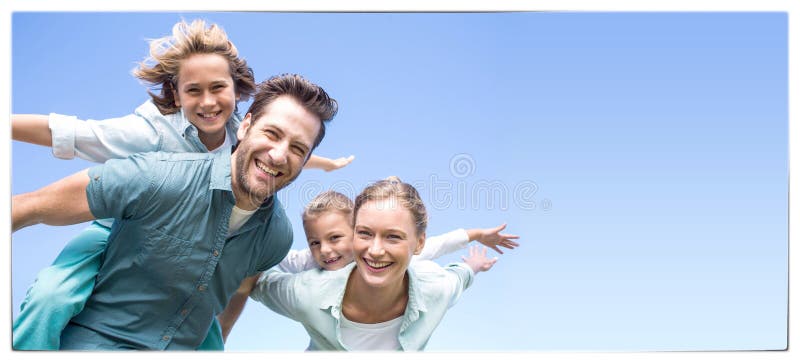 Happy parents with their children stock images
