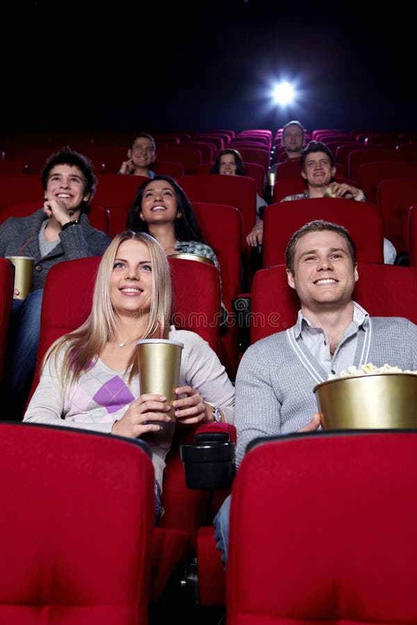 Happy people in the cinema