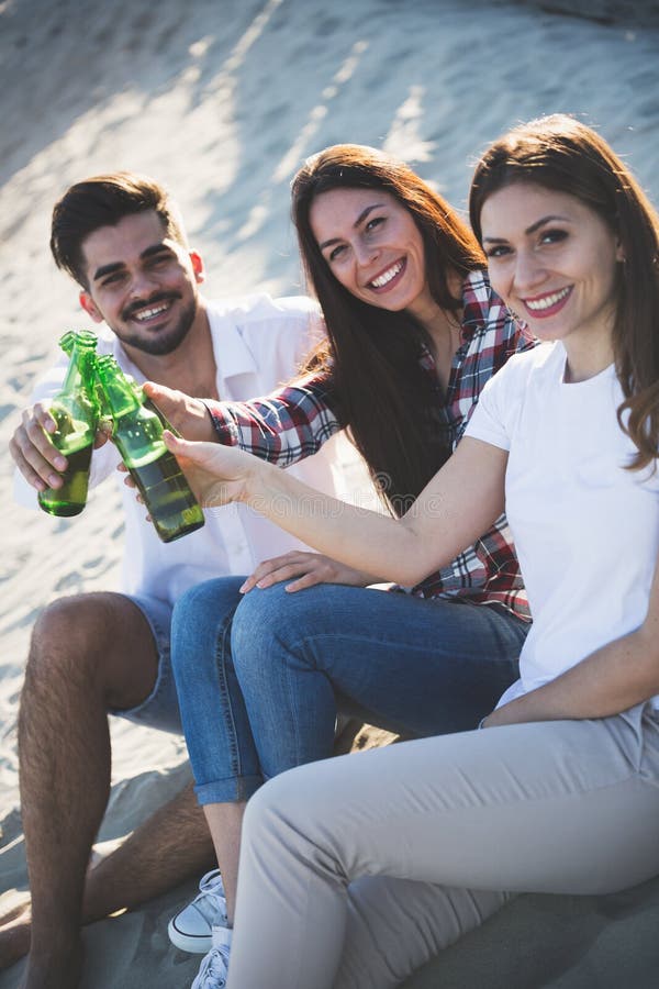 Happy People Drinking And Having Fun At Beach Stock Image Image Of