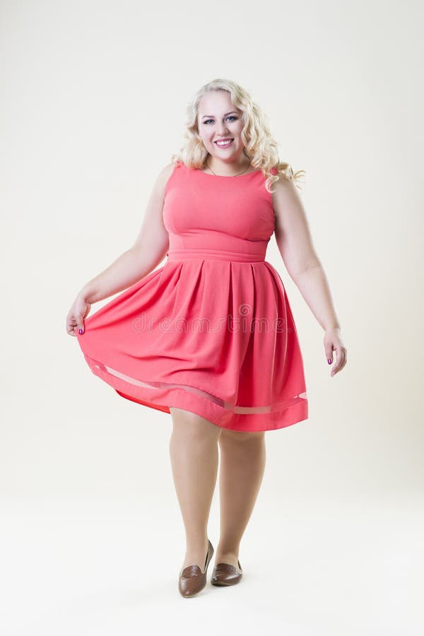 Happy Plus Size Fashion Model, Fat Woman on Beige Background Stock ...