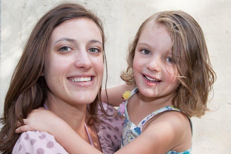 Portrait of beautiful young mother with little pretty daughter royalty free stock image Portrait of beautiful young mother with little pretty daughter royalty free stock image