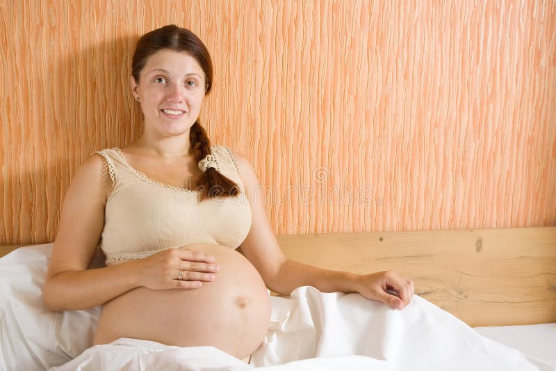 Happy pregnant woman royalty free stock image