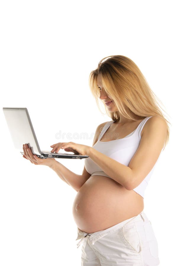 Happy pregnant woman with laptop