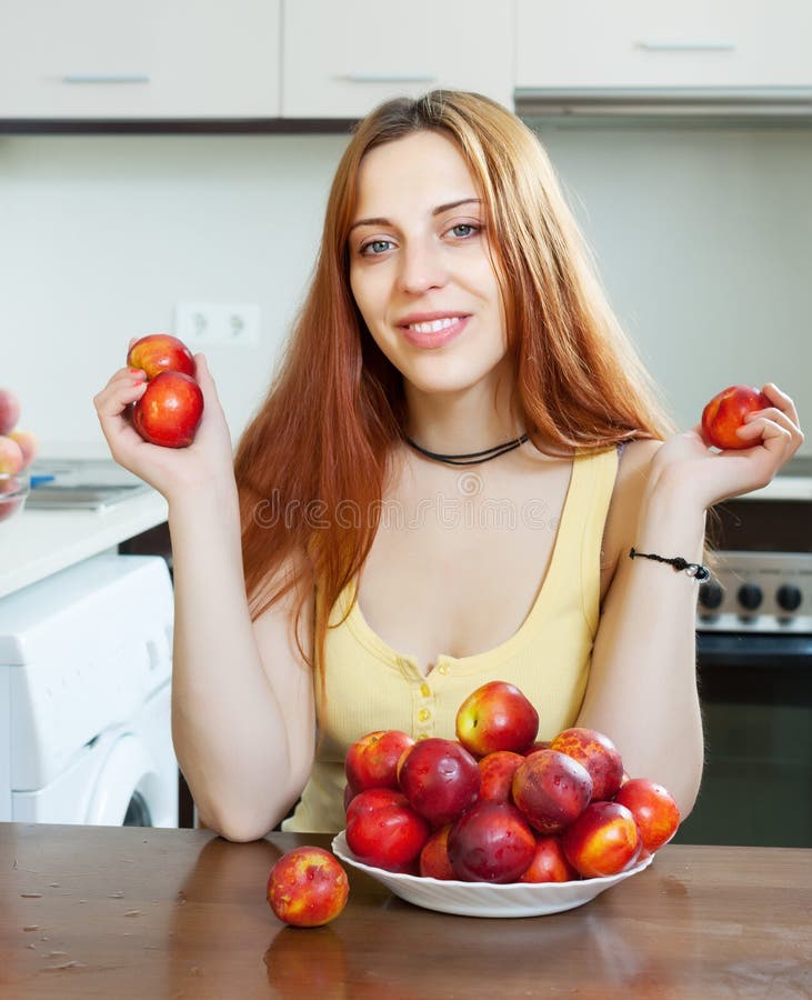 Happy Pretty Woman Holding Nectarines Stock Photo Image of eating