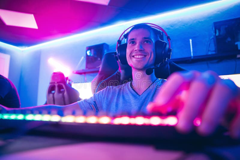 Excited Girl Gamer Sitting at the Table, Playing Online Games Stock Image -  Image of headset, esports: 136171701