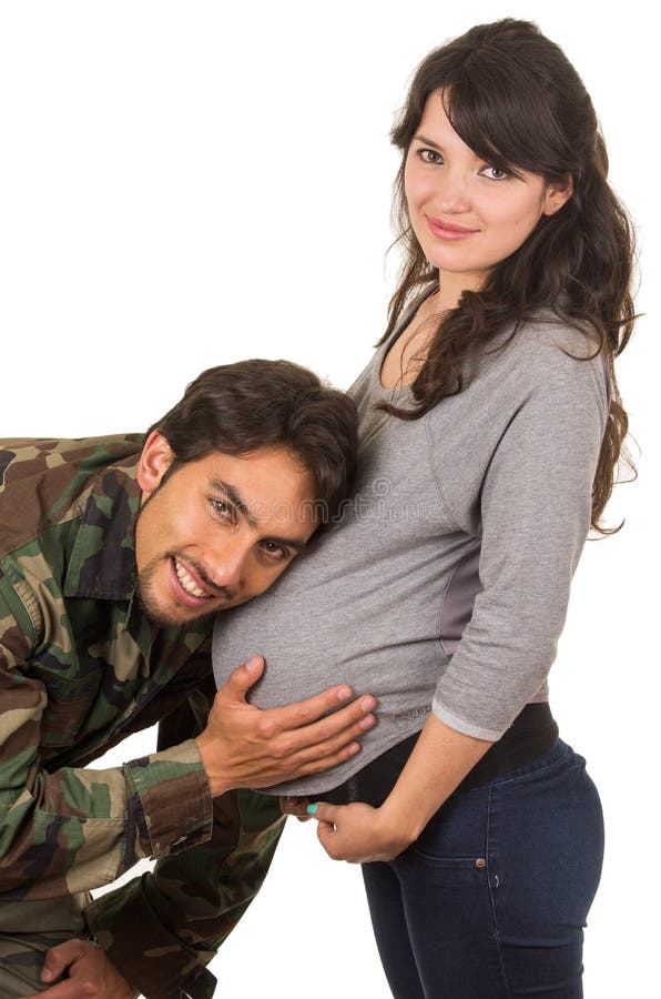 Happy proud military soldier hugging pregnant wife royalty free stock image Happy proud military soldier hugging pregnant wife royalty free stock image