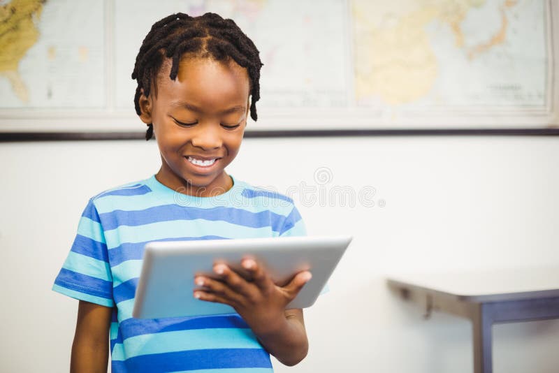 Happy Schoolboy Using Digital Tablet in Classroom Stock Image Image