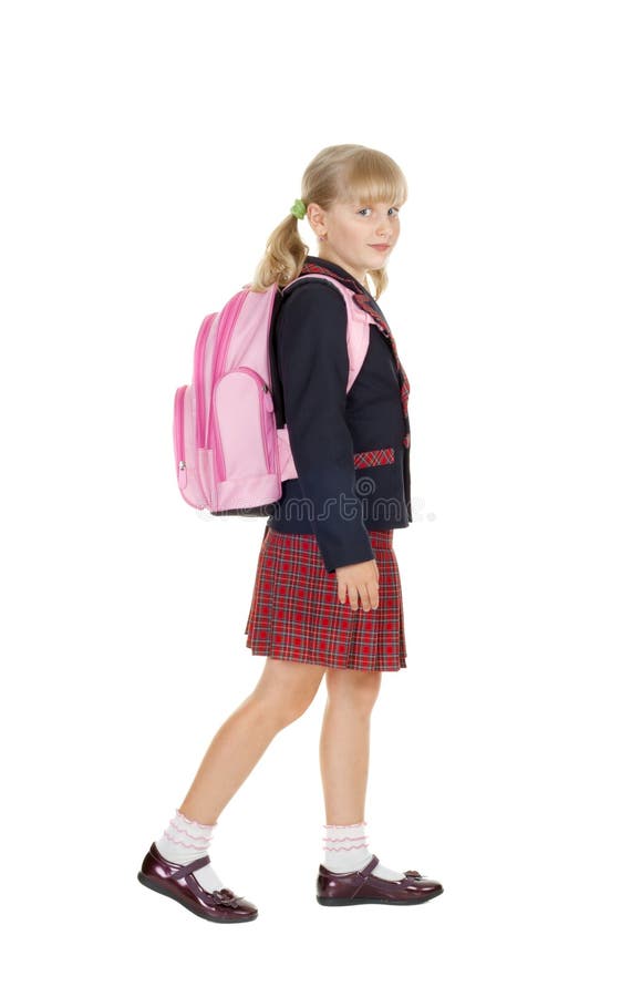 Happy schoolgirl goes to school